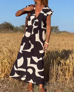 Victoria™ Elegant V-Neck Printed Dress
